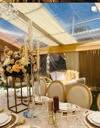 Gold candelabra centrepiece and place settings